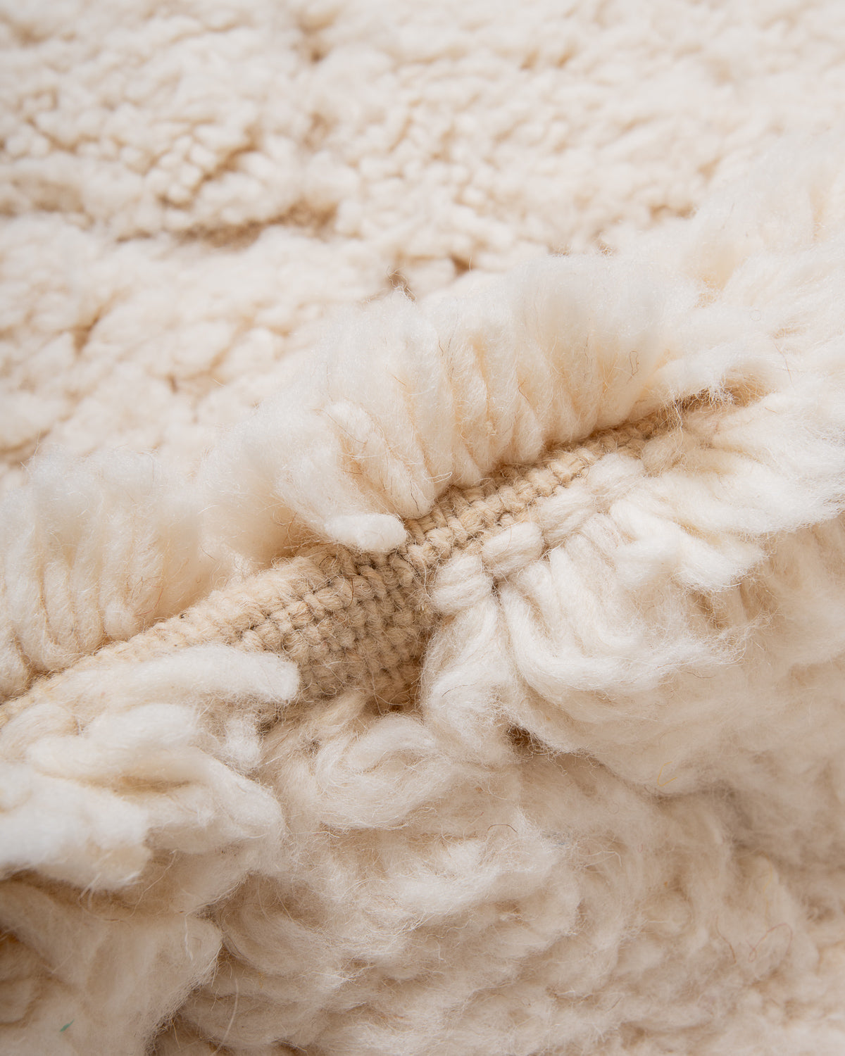 Modern, designer, handcrafted Berber rug from Morocco. Beniourain carpet with beautiful colours and patterns and fluffy wool texture.